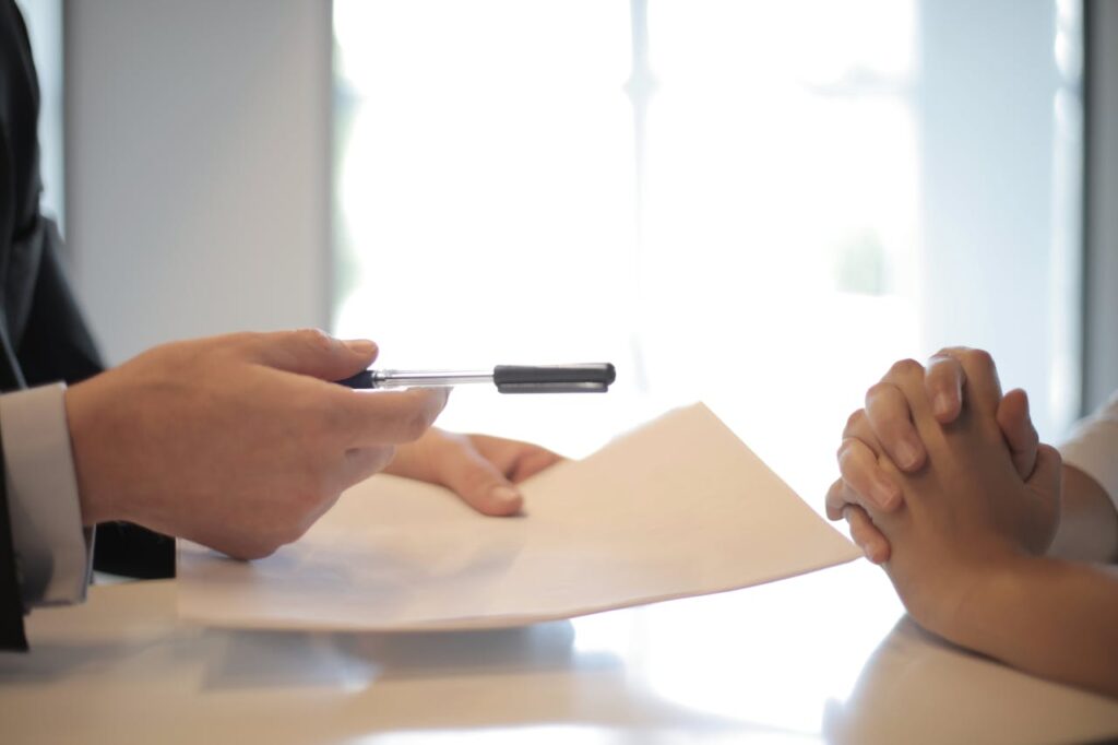 Signing Paperwork at a desk